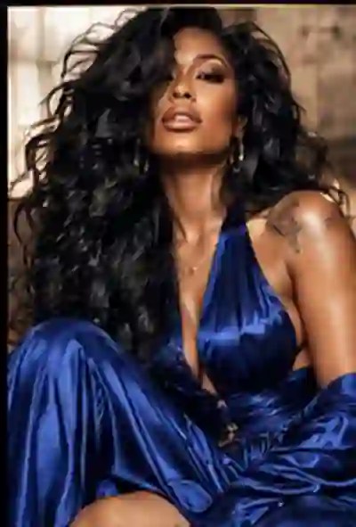 Sable Monroe in a sapphire-blue couture look