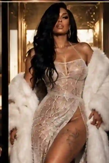 Sable Monroe in white couture and fur